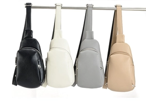 Detailed row of stylish PU leather chest bags in black, beige, gray and khaki colors