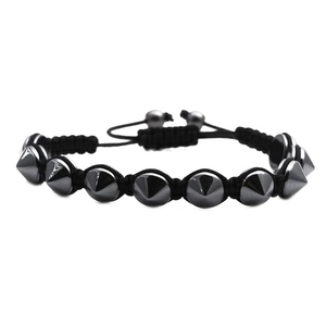 Adjustable black beaded bracelet with polished metallic cone studs for men in punk style