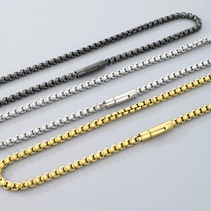 Three-color box chains in silver, gold, and black with polished finish and magnetic clasps