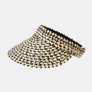 Detail view of woven straw visor featuring black and yellow pattern with zigzag brim