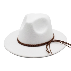 Detail of white felt fedora hat featuring brown braided cord and fringe tassels decoration