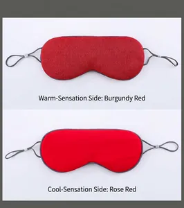 Detail of dual-sided sleep mask showing warm and cool fabric with adjustable straps