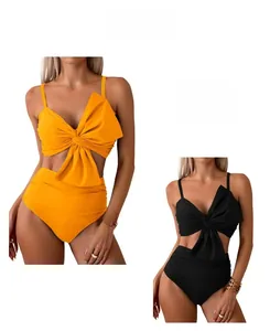 Detail view of high waist bikini sets with bow decoration and ribbed texture fabric