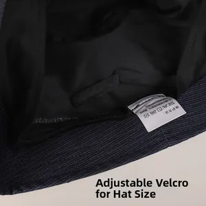 Détail de la sangle velcro réglable et du bandeau à l'intérieur du chapeau bob