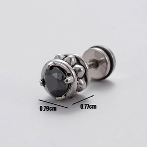 Detailed macro view of silver steel stud earring with black zircon setting and dimensions