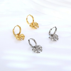 Polished titanium steel bow pendant hoop earrings in gold and silver finishes