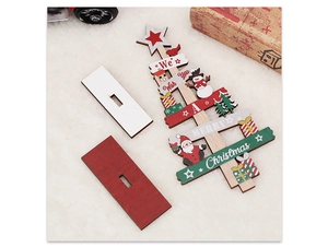 Detail of wooden Christmas tree DIY table decor with painted snowman and Santa motifs