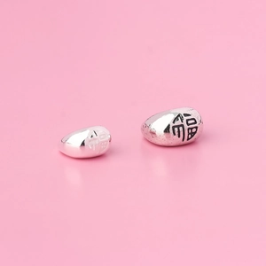 Solid S925 sterling silver pebble charm with Fu character engraving on pink background