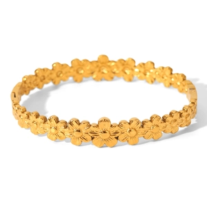 Elegant gold stainless steel flower bracelet with a minimalist waterproof floral design