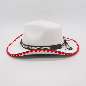 Detail of white felt jazz hat featuring red wavy edge stitching and brown leather band