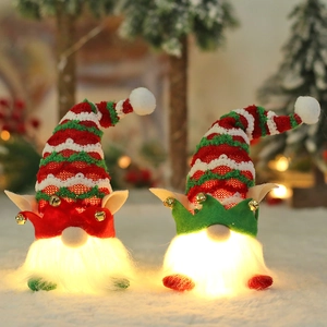 Lighted Christmas Gnomes with red and green knit hats and warm LED glowing base decoration