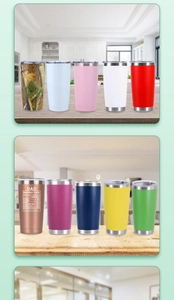 Multiple 20oz double-walled stainless steel tumblers in various colors on a wooden surface