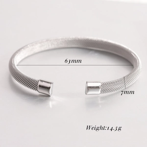 Detail of 7mm silver mesh cuff bracelet with 63mm inner diameter and 14.5g weight