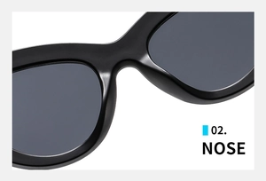 Detail of ergonomic integrated nose pads on black matte cat eye sunglasses frame