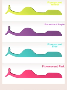 Close-up of false eyelash applicator tweezers in four vibrant fluorescent colors
