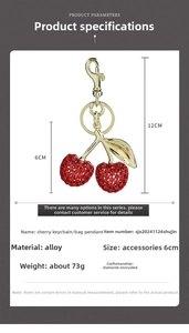 Detailed view of red rhinestone cherry keychain with dimensions and alloy hardware