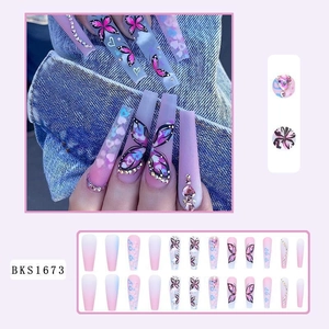 Long coffin purple gradient press-on nails with butterfly pattern and rhinestone accents