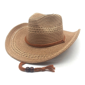 Detail of woven straw cowboy hat with ethnic beads and adjustable chin strap