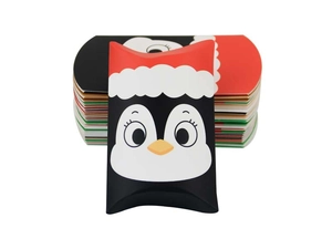 Detail view of penguin themed Kraft Christmas pillow boxes showing folded and flat units