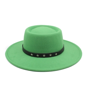 Detail of green wool fedora hat featuring a black leather band with silver star rivets