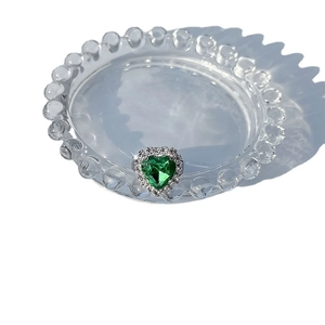 Elegant heart-shaped green crystal ring with pavé diamond halo in silver stainless steel