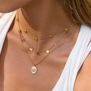 Layered 18K gold stainless steel necklace with pink butterfly pendant and heart charms