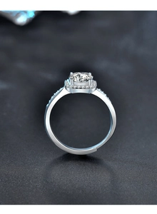 Macro side view of 1 carat moissanite halo ring with 925 silver adjustable open band