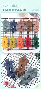 Close-up of matte vintage floral hair clips in ten diverse Morandi colors