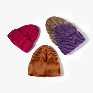Classic knitted beanies in vibrant colors for outdoor winter warmth and fashion