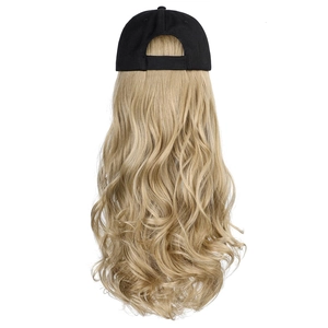 Detail of blonde long wavy synthetic hair attached to a black baseball cap for women