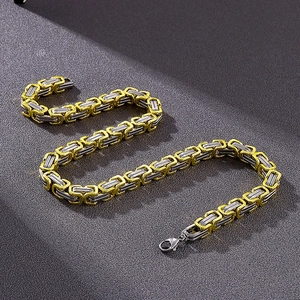 Close-up of 8mm gold and silver two-tone hip-hop chain link necklace with lobster clasp