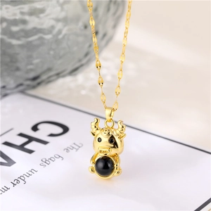 Golden ox pendant necklace with black projection stone on minimalist fine O-chain link
