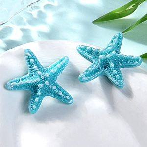 Detailed view of blue resin starfish ornaments with realistic texture for DIY accessories