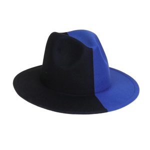 Detail of two-tone wool felt fedora featuring symmetrical black and royal blue contrast