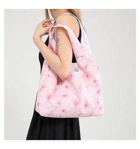 Floral shoulder tote bag featuring pink tie-dye pattern and white linear flowers detail