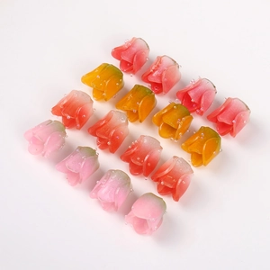 Detailed macro view of multi-colored gradient tulip resin beads for DIY jewelry making
