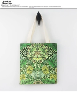 Detail of William Morris floral canvas tote bag hanging on a minimalist wall hook