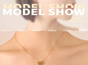 Close-up of gold-plated woven heart pendant necklace and beaded jewelry on female model