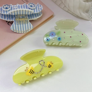 Three sweet floral and bee acetate hair claws with rhinestones for women hair styling
