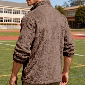 Men's dark brown fleece jacket with stand collar and zipper in outdoor sports setting