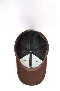 Detail of baseball cap interior showing breathable black mesh and durable stitching