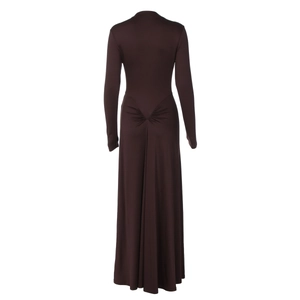 Macro detail of French long sleeve dress with waist pleats and slim silhouette
