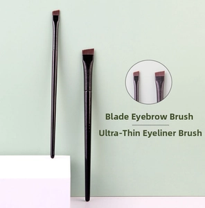 Detail of professional ultra-thin blade eyeliner brush and angled eyebrow brush bristles