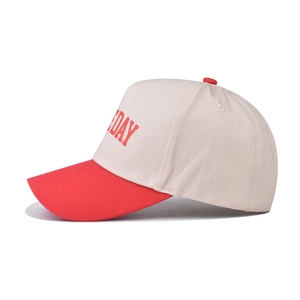 Detailed side view of two-tone GAME DAY baseball cap with red brim and white canvas crown