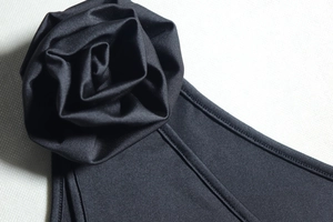 Detail of 3D rose floral applique on black sexy backless bodycon dress fabric