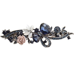 Pince à cheveux paon vintage avec strass bleus et fleurs roses sur métal sombre