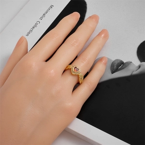 Gold plated open ring with red heart cubic zirconia and braided band for women