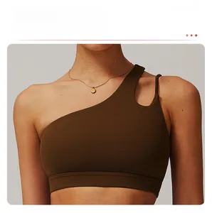 Close-up of asymmetrical one-shoulder sports bra with breathable matte fabric