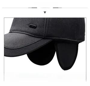 Close-up of winter baseball cap with ear flaps and thick fleece lining in dark grey