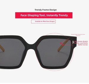 Close-up of black geometric oversized sunglasses with brown wood-textured temple details